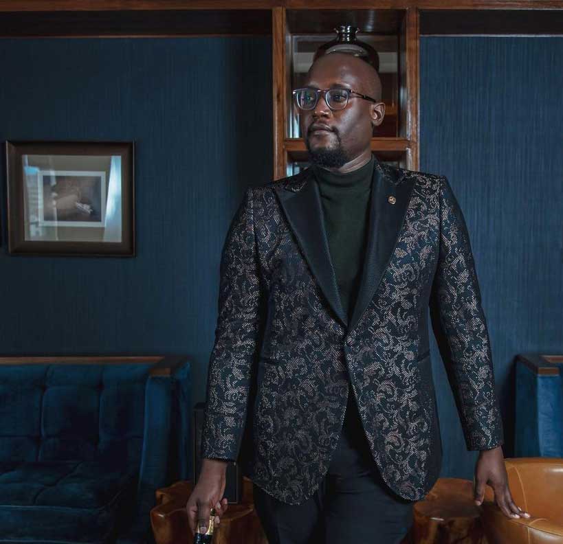 Gentleman standing in a lounge