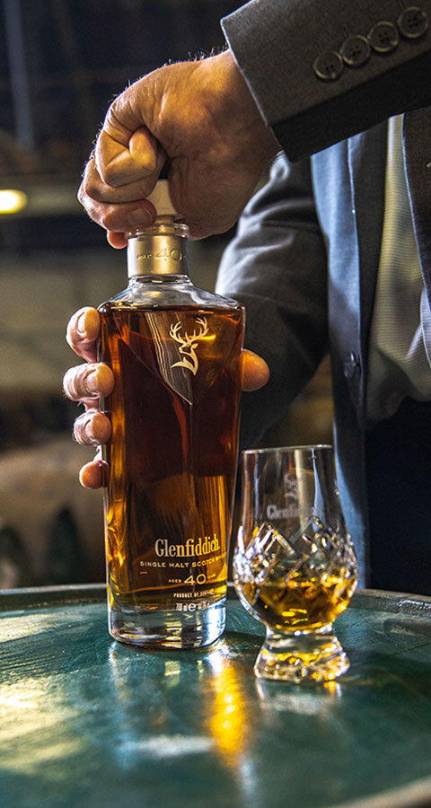Glenfiddich 40 Year Old Single Malt Scotch Whisky bottle being opened