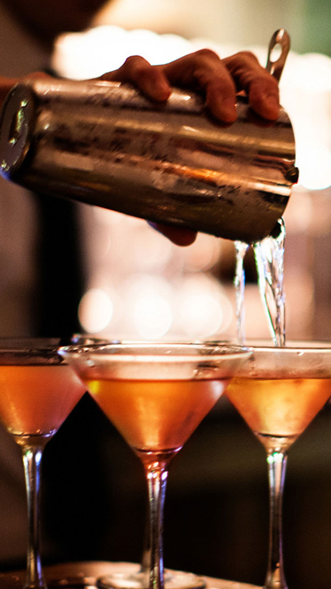 Man pouring cocktails