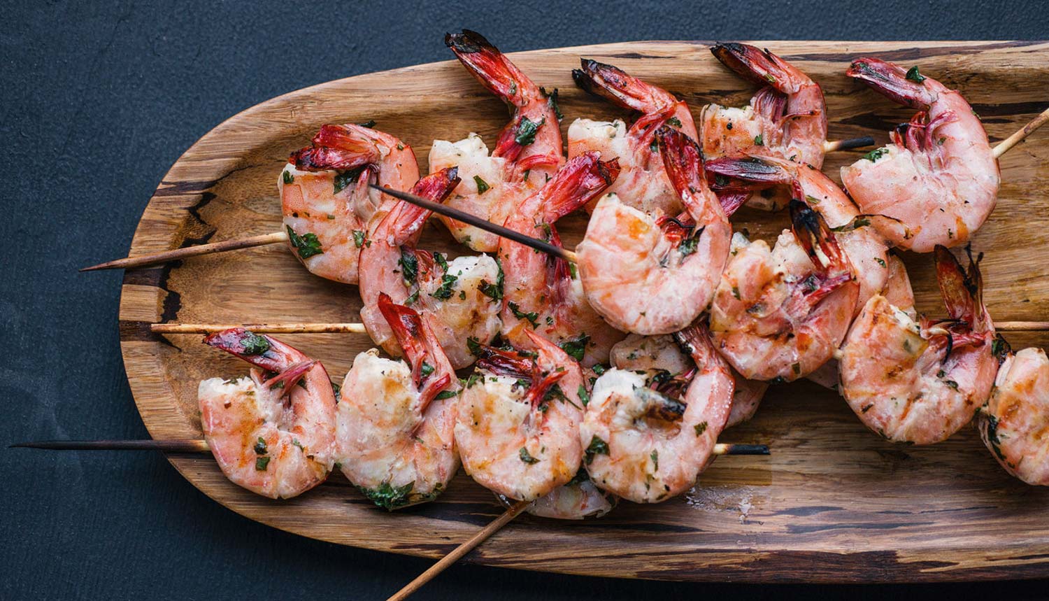 Shrimp on a wooden platter