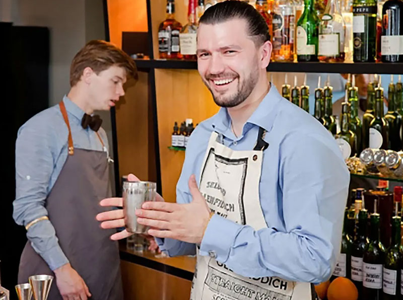 Bartenders making a cocktail