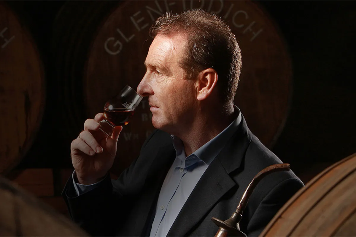 Man smelling the aroma of whisky