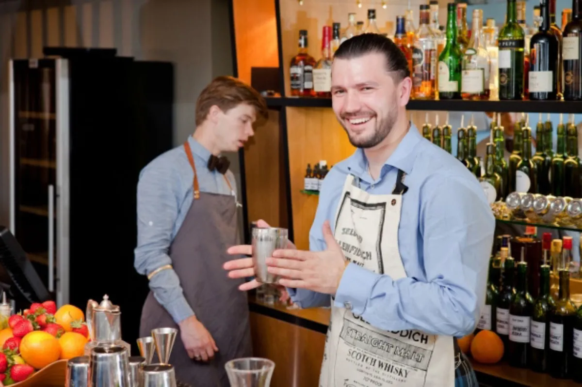 Bartenders making a cocktail